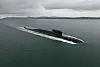 Ballistic missile submarine moving across calm sea near the Kola Peninsula