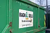 Green Ragn-Sells container with logo and website on the side.