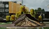 A model of Raknehaugen showing a cross-section of the mound clearly illustrating how the timber logs were stacked in layers in a cone-like structure.