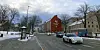 Winter street scene with cars, trees, and buildings in the Elgeseter Innovation District, Trondheim.