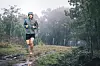 Man running in the rain.