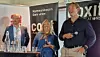 Three panellists speak on stage at Arendalsuka during a discussion about bed bugs.