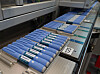 Blue Ozempic injection pens arranged on a conveyor at Novo Nordisk’s facility in Hillerød, Denmark.