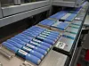 Blue Ozempic injection pens arranged on a conveyor at Novo Nordisk’s facility in Hillerød, Denmark.