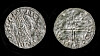 Close up of the front and back of the coin.